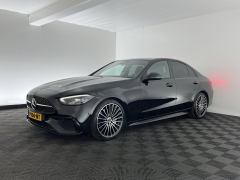 Mercedes-Benz C-Klasse 180 AMG Line (INCL.BTW) *LEATHER | FULL-LED | HEATED-SPORTSEATS | DIGI-COCKPIT | BLINDSPOT | CAMERA | DAB | AMBIENT-LIGHT | SHIFT-PADDLES | PRIVACY-GLASS | ECC | PDC | CRUISE | 19''ALU*