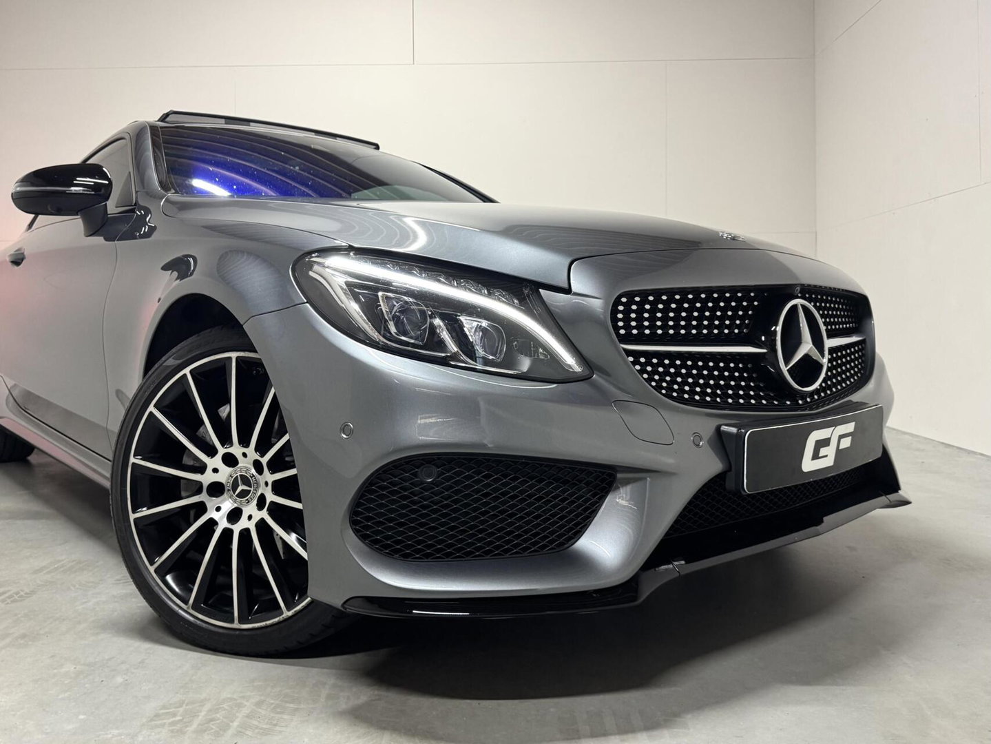 Mercedes-Benz C-Klasse Coupé 200 4MATIC AMG Pano 360° Sfeer Carplay