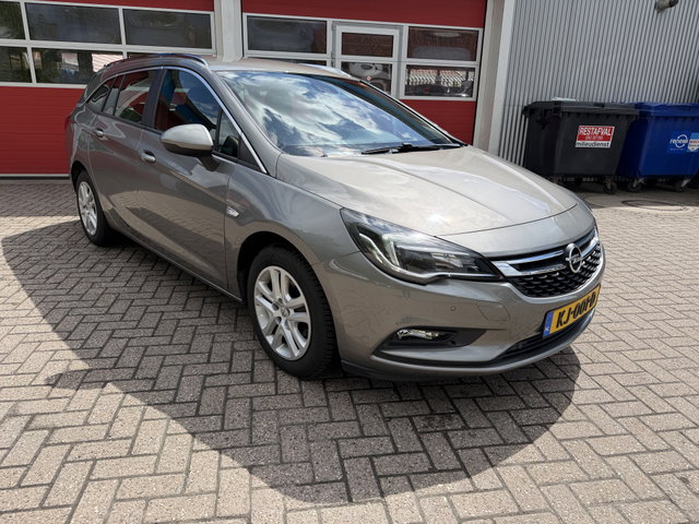 Opel Astra - Sports Tourer 1.4 150 PK | Business+ | Stoelverwarming | Stuurwielverwarming | Navigatie |
