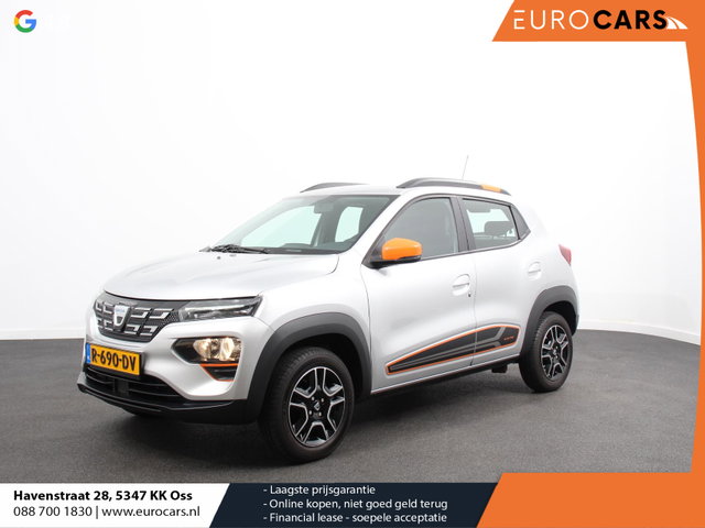 Dacia Spring - Comfort Plus (Orange Pack) 27 kWh Airco Cruise Control Navigatie Camera Licht metalen velgen