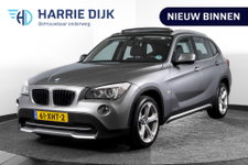 BMW X1 - sDrive20i 184 PK - Automaat Orig. NL | Luxery-Line | S/K Panodak | Trekhaak | Cruise | PDC | NAV | Auto.Airco | LM 18" |