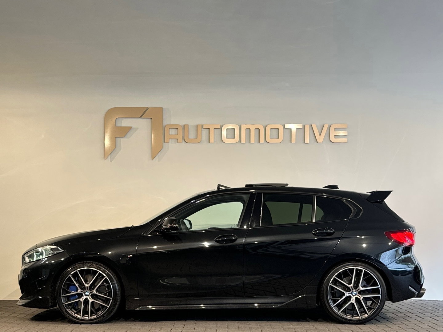 BMW 1-serie M135i xDrive High Executive Pano|Leer|HuD|HK|BTW