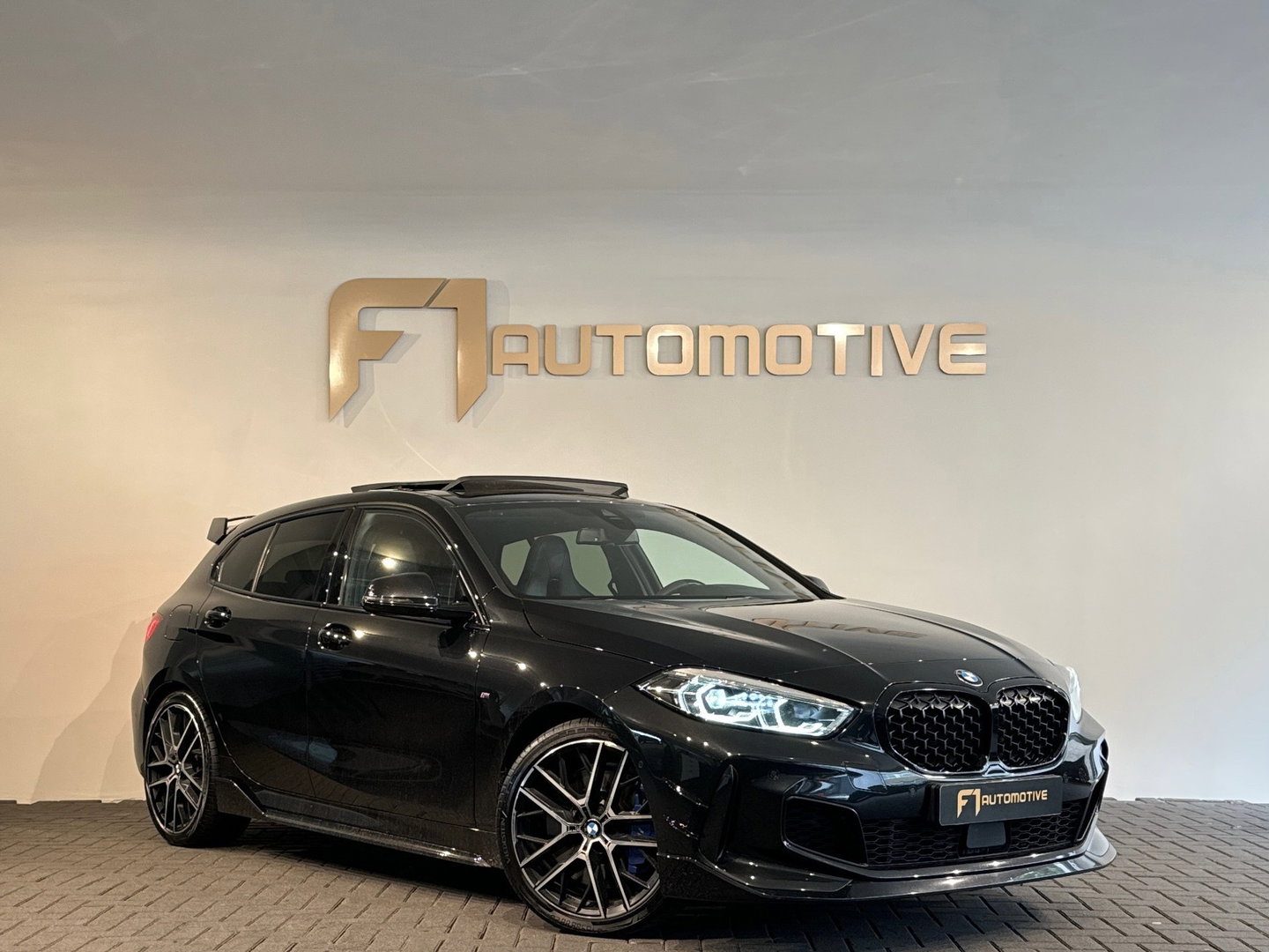 BMW 1-serie M135i xDrive High Executive Pano|Leer|HuD|HK|BTW