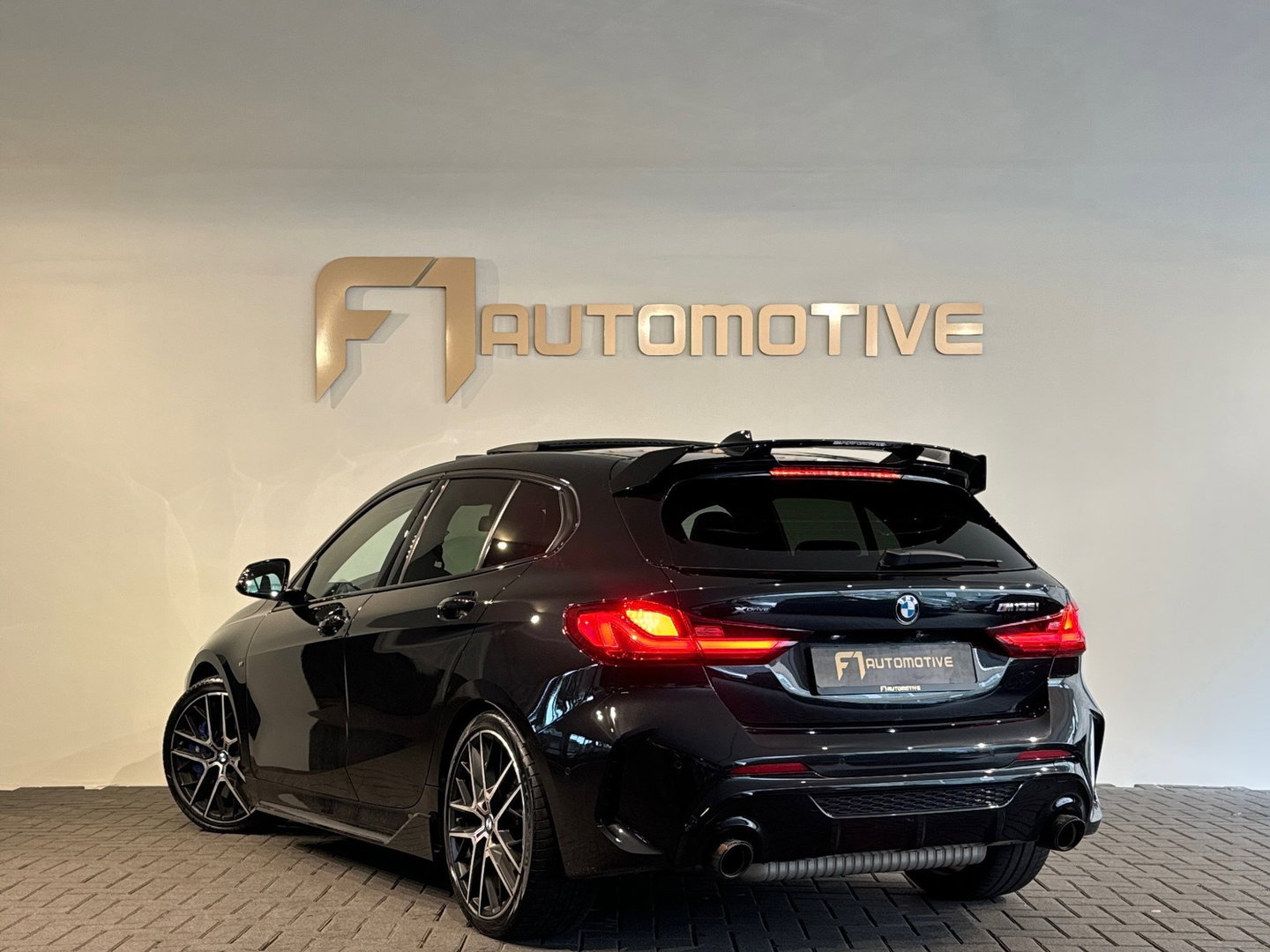 BMW 1-serie M135i xDrive High Executive Pano|Leer|HuD|HK|BTW