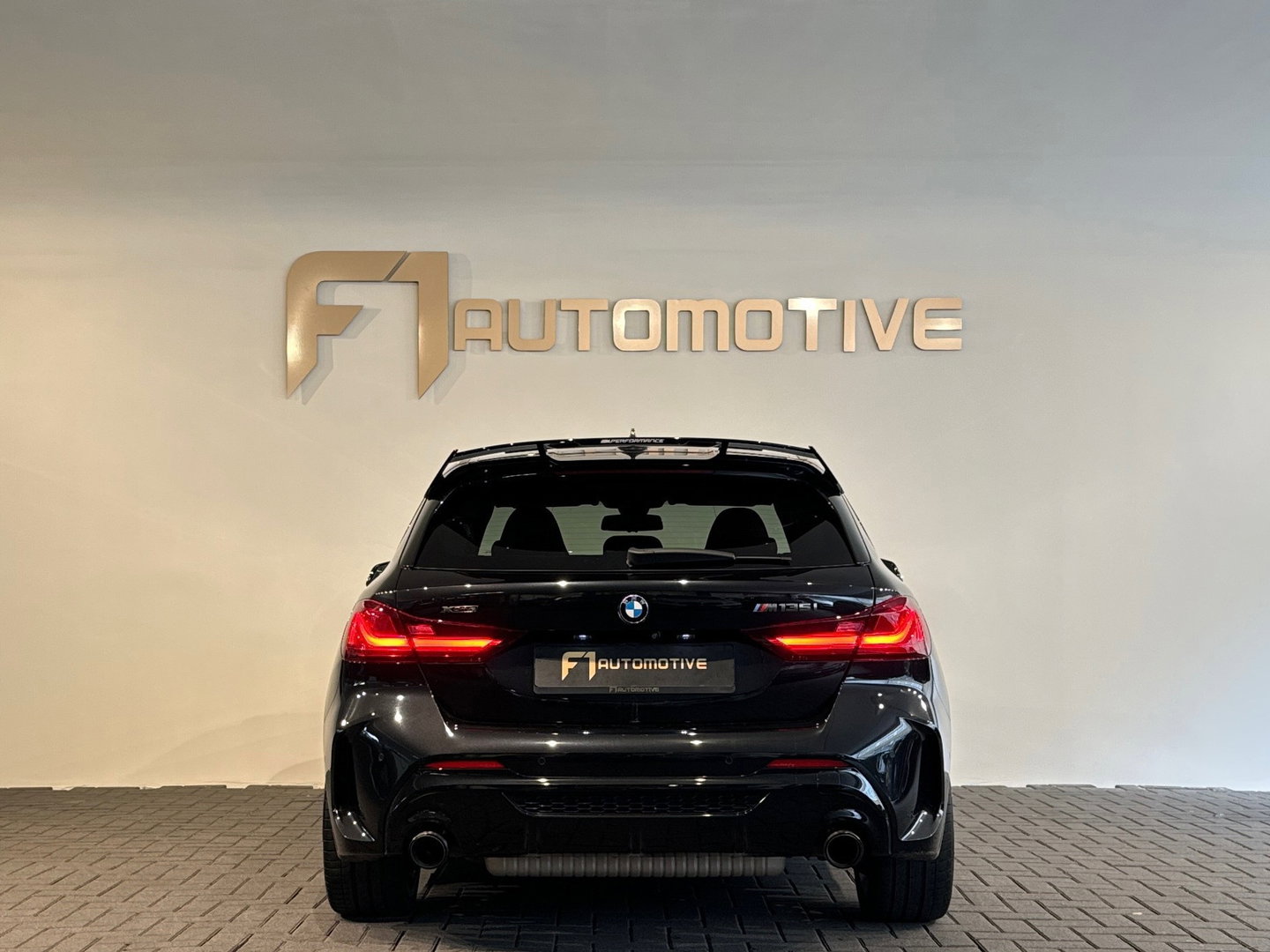BMW 1-serie M135i xDrive High Executive Pano|Leer|HuD|HK|BTW