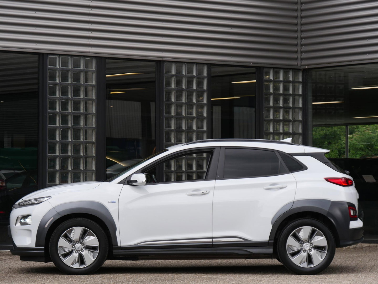 Hyundai KONA EV 64kWh PREMIUM/ LEER/ ELEKT. STOELEN/ WARMTEPOMP / SOH 100%