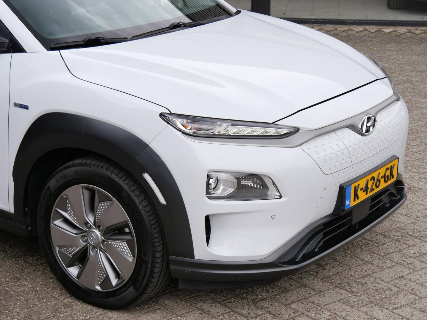 Hyundai KONA EV 64kWh PREMIUM/ LEER/ ELEKT. STOELEN/ WARMTEPOMP / SOH 100%