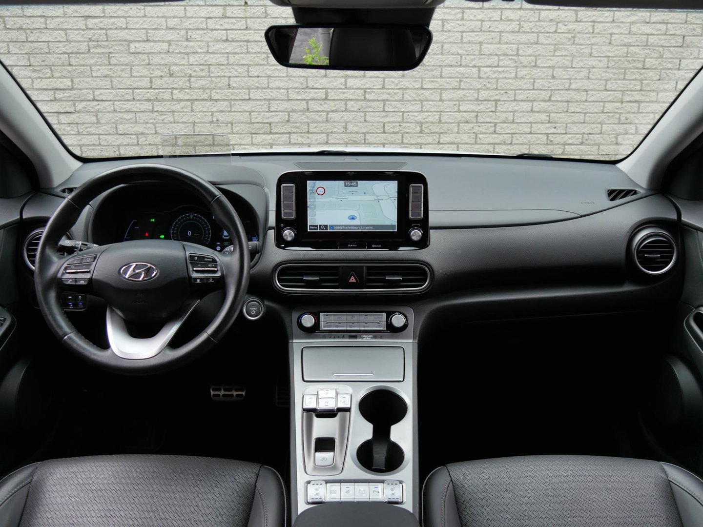 Hyundai KONA EV 64kWh PREMIUM/ LEER/ ELEKT. STOELEN/ WARMTEPOMP / SOH 100%