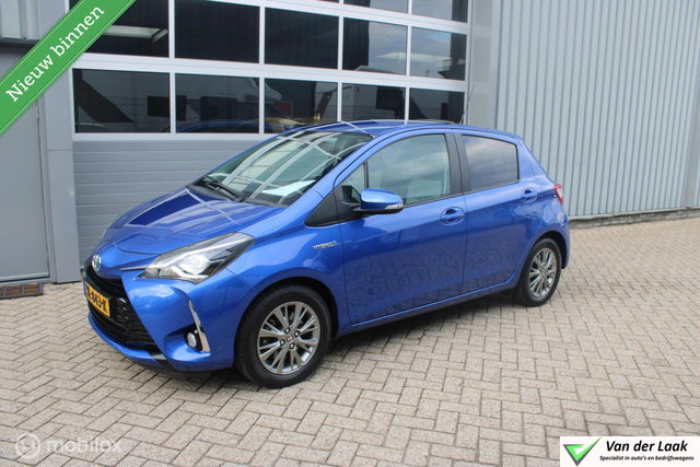 Toyota Yaris - 1.5 Hybrid Dynamic | Trekhaak | Sportvelgen | Navigatie | NL Auto Boekjes.