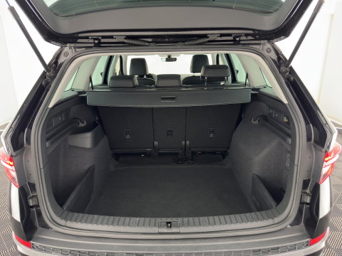 Škoda Kodiaq 1.5 TSI Business Edition (INCL.BTW) *LEATHER-FABRIC | FULL-LED | DIGI-COCKPIT | CAMERA | KEYLESS | DAB+ | NAVI-FULLMAP | SPORT-SEATS | PRIVACY-GLASS | ECC | PDC | CRUISE | 20''ALU | TOWBAR*