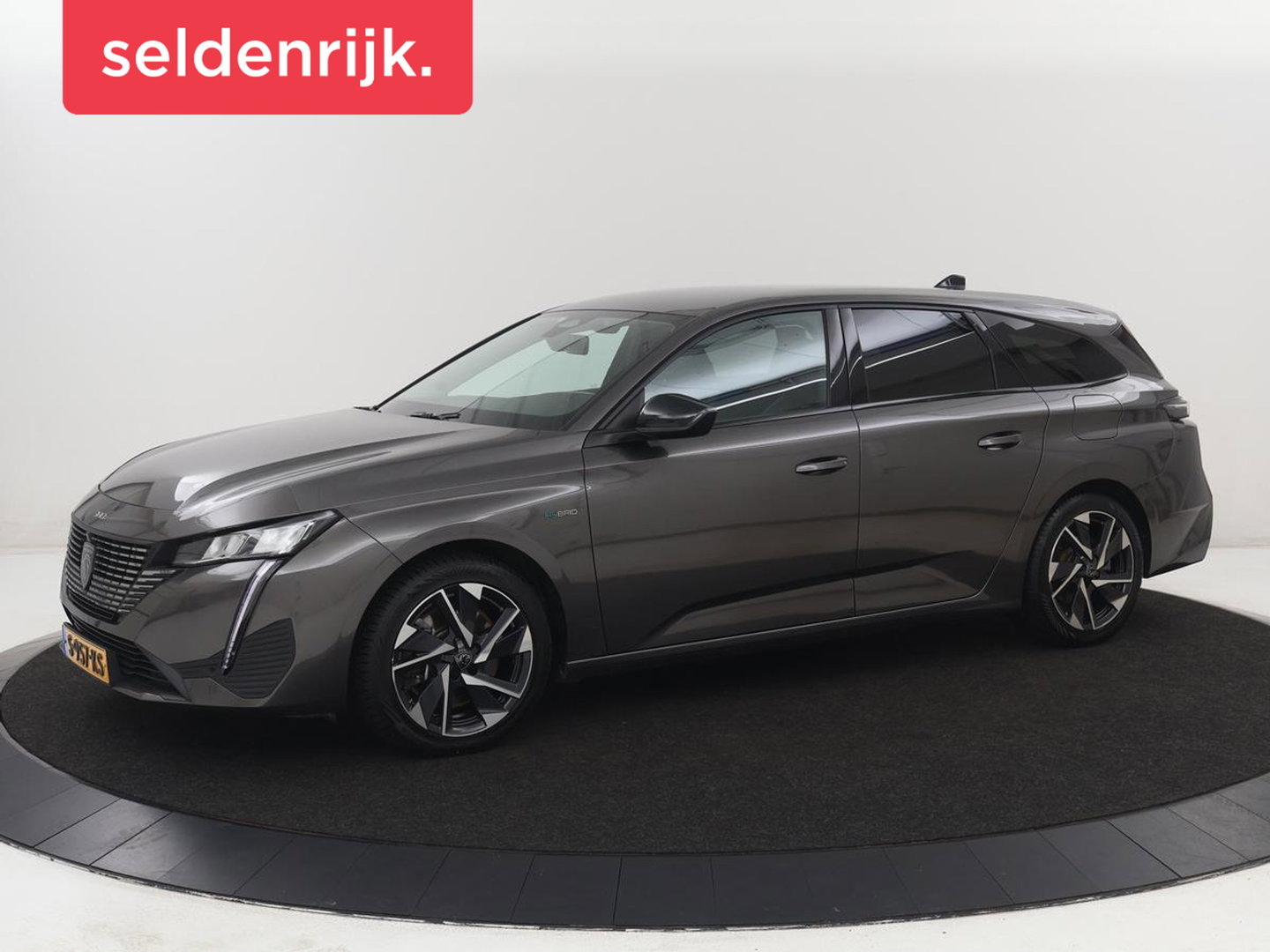 Peugeot 308 1.6 HYbrid 180 Allure Pack Business | SOH 93,8% | Trekhaak | Adaptive cruise | Half leder | Camera | Carplay | Navigatie | Keyless | Full LED | Parkeerhulp | Climate control | PHEV | Plug In