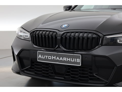 BMW 3 Serie Touring 320e M Sport | SOH 90.7% | Facelift | Shadow Line | Curved display | Adapt. Cruise | Nav + CarPlay | Elek. Klep | Sfeerverlichting | LED | Stoelverw. | PDC
