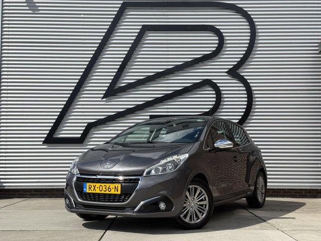 Peugeot 208 - 1.2 PureTech Blue Lease Executive 2e Eigenaar|Navi|Carplay|D-riem vv in 2025|Trekhaak|PDC|Clima|N.A.P|APK tot 02-2027