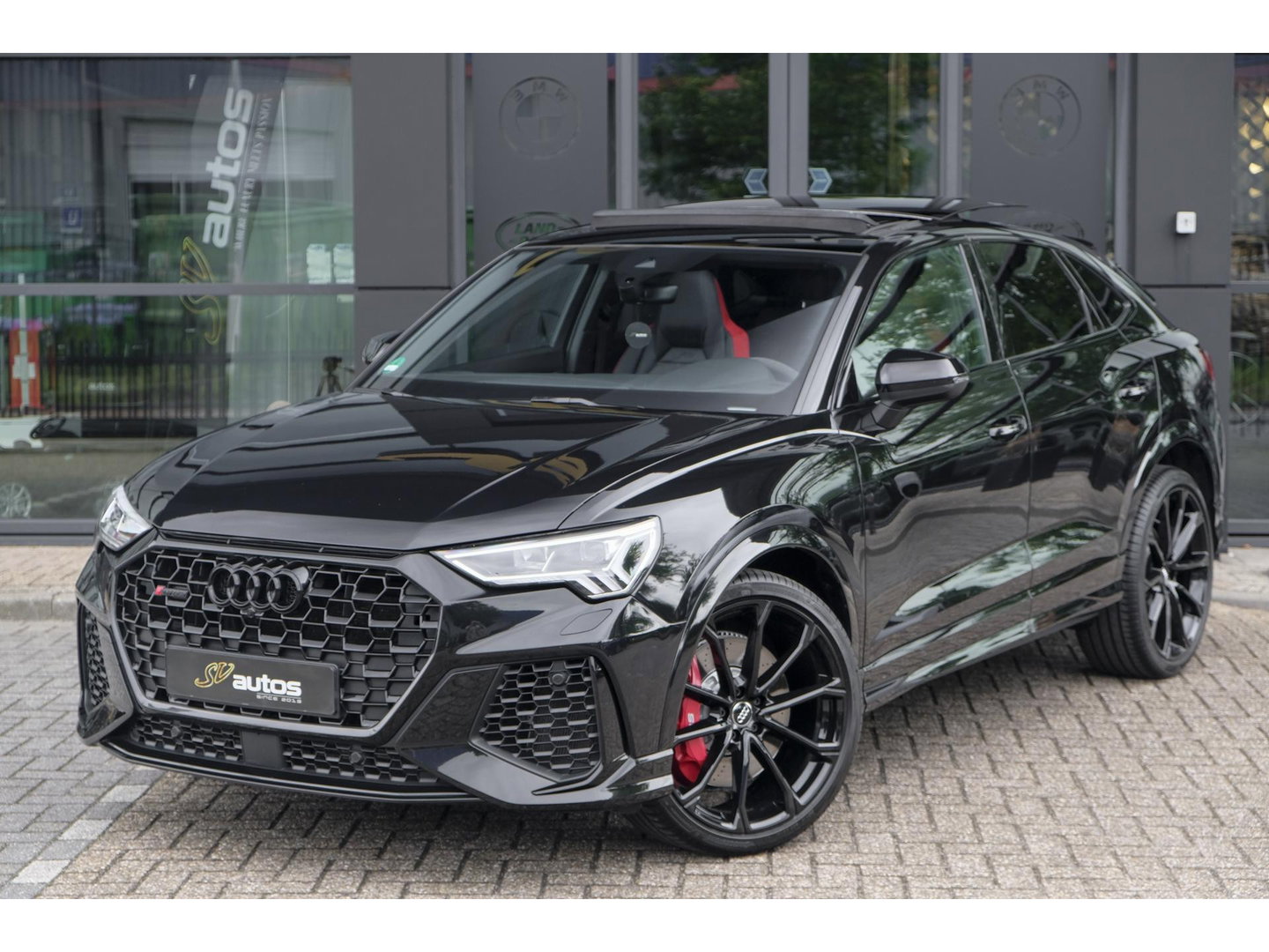 Audi RSQ3 Sportback TFSI 400pk Panoramadak Sonos Trekhaak 21" LMV BOMVOL Rode stiksels Carbon