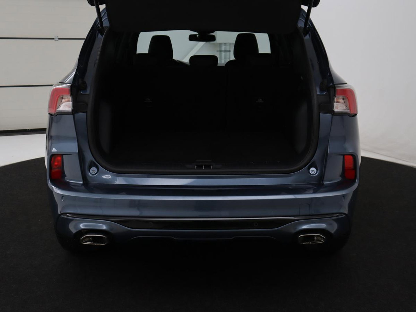 Ford Kuga 2.5 PHEV ST-Line | SOH 87,2 | Adaptive cruise | Camera | Full LED | Climate control | Dodehoek detectie | Carplay | Navi. Full map | DAB
