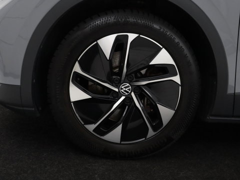 Volkswagen ID.4 Tech 77 kWh | SOH 92,2% | Panorama | 360 Camera | Head up | Virtual cockpit | Sfeerverlichting | Stoel/Stuurverwarming | Adaptive cruise | Carplay | Traffic assist | Climate control | Half leder/velours