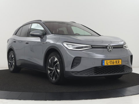 Volkswagen ID.4 Tech 77 kWh | SOH 92,2% | Panorama | 360 Camera | Head up | Virtual cockpit | Sfeerverlichting | Stoel/Stuurverwarming | Adaptive cruise | Carplay | Traffic assist | Climate control | Half leder/velours