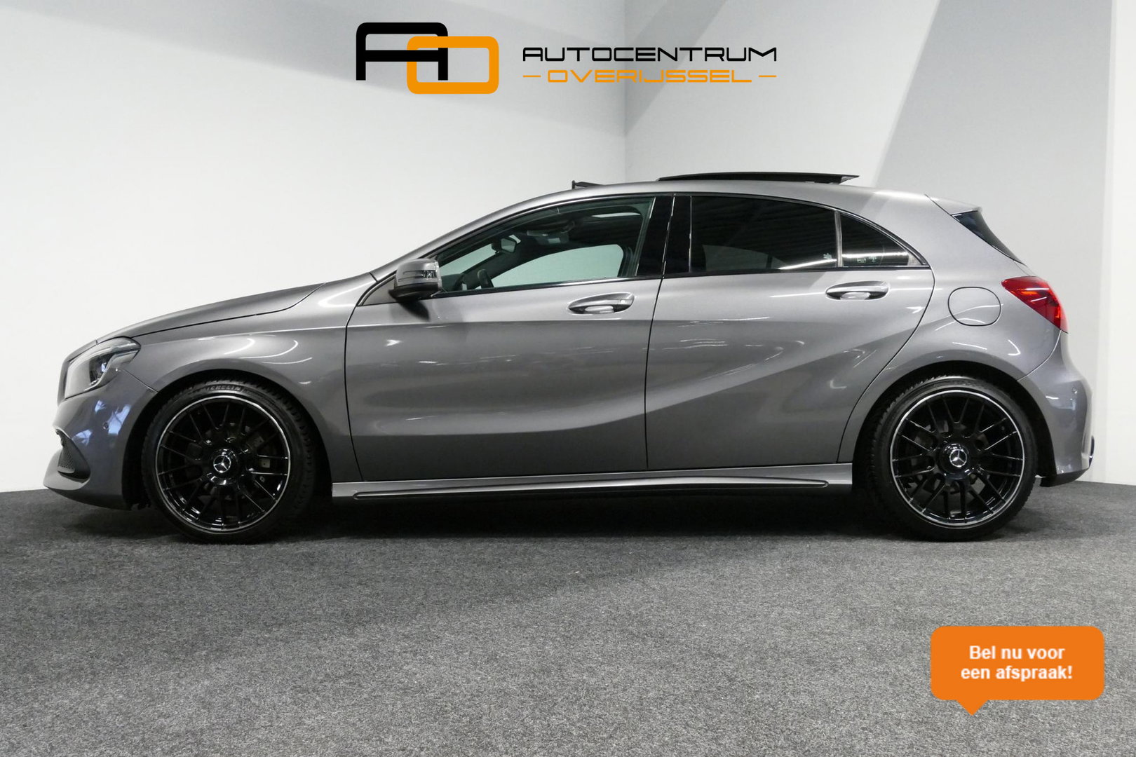 Mercedes-Benz A-Klasse 200 AMG Line / A45 AMG Diffuser / Panamericana Grille / Panoramadak / Carbon interieurdelen / Stoelverwarming / LED High Performance / Cruise Control / 18'' LMV / Agility Control / PDC V+A