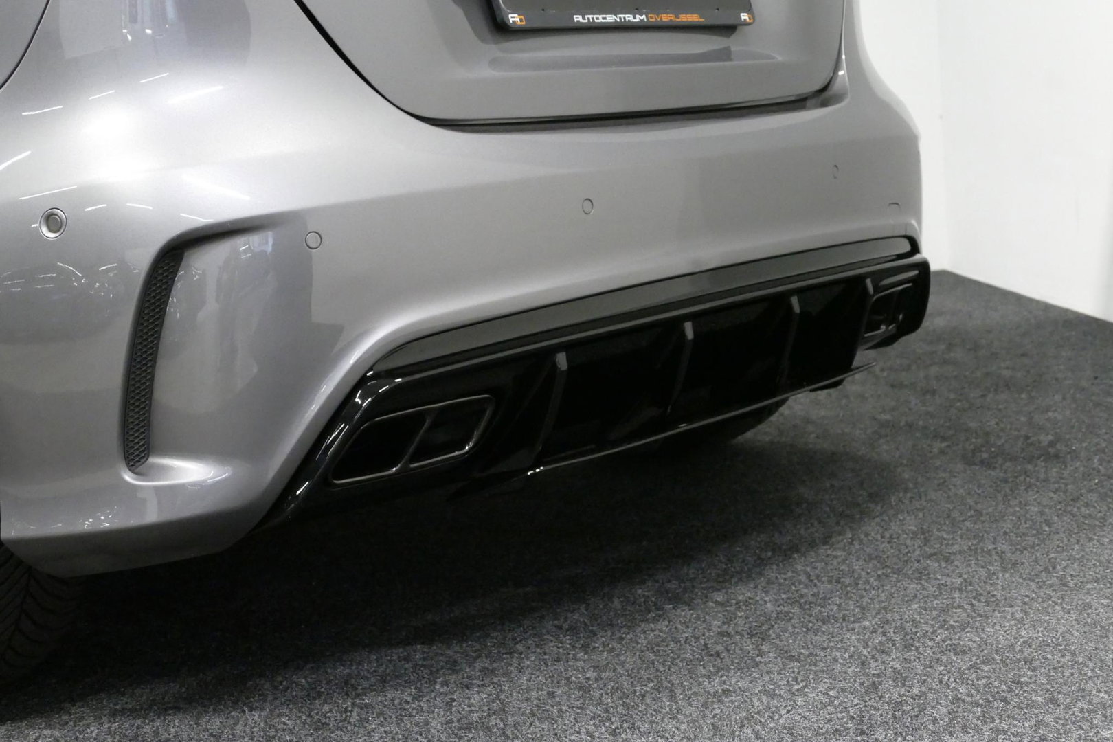 Mercedes-Benz A-Klasse 200 AMG Line / A45 AMG Diffuser / Panamericana Grille / Panoramadak / Carbon interieurdelen / Stoelverwarming / LED High Performance / Cruise Control / 18'' LMV / Agility Control / PDC V+A