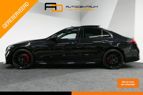 Mercedes-Benz C-Klasse 300 e AMG Line / C63s AMG Diffuser / Brabus look Grille / Panoramadak / Elektr. verstelbare voorstoelen + memory / Digital Light (Laser) / Ambienteverlichting / Stoelverwarming / Apple Carplay - Android Auto / Achteruitrijcamera / Dodehoek detectie / 20''