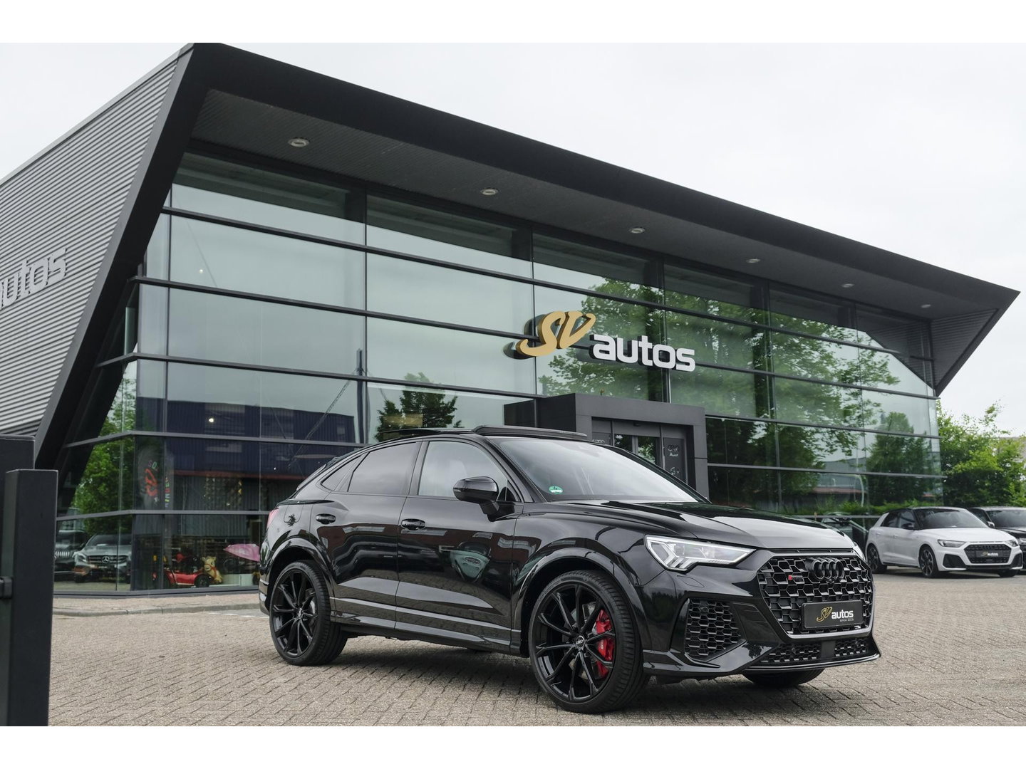 Audi RSQ3 Sportback TFSI 400pk Panoramadak Sonos Trekhaak 21" LMV BOMVOL Rode stiksels Carbon