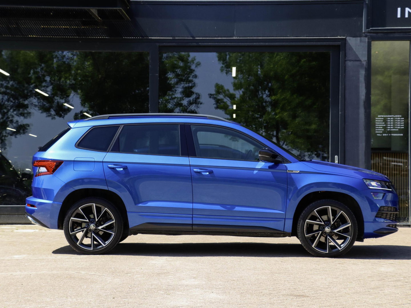 Škoda Karoq 1.5 TSI ACT Sportline 150PK DSG Camera Navi Stoel/Stuurverw. Race Blue 19 inch
