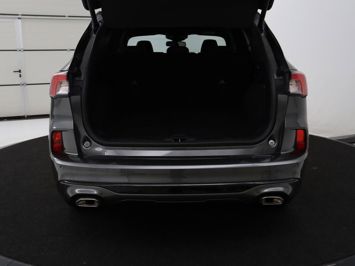 Ford Kuga 2.5 PHEV ST-Line | SOH 94,5% | Adaptive cruise | Leder/Alcantara | Camera | Carplay | Side Assist | Navigatie | Keyless | Parkeerhulp | Elektrische kofferklep | Climate control | Plug In