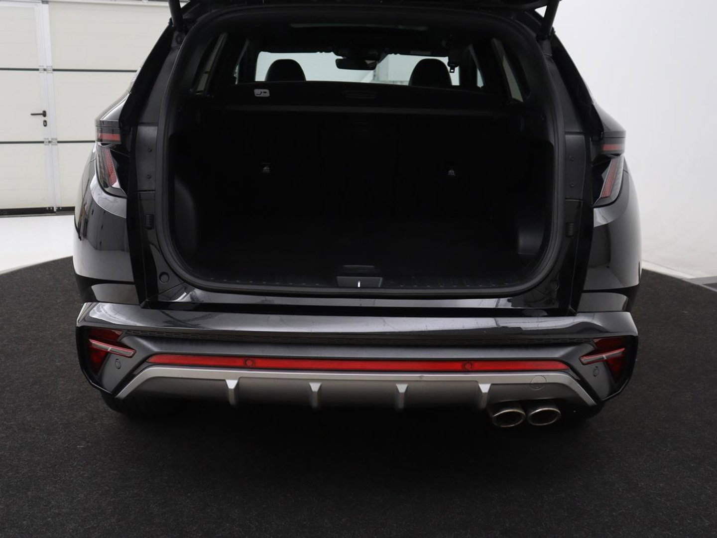 Hyundai Tucson 1.6 T-GDI PHEV N Line Sky 4WD | Panoramadak | Stoelverwarming | Leder/Alcantara | Camera | Adaptive cruise | Carplay | Full LED | Stuurverwarming | Keyless | Plug In