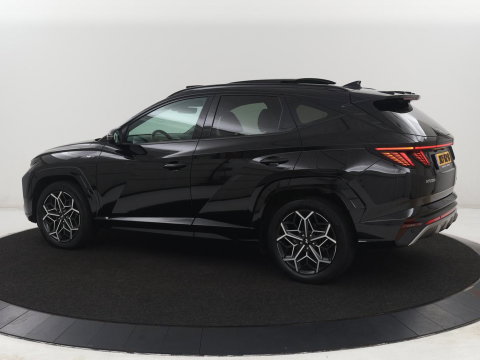 Hyundai Tucson 1.6 T-GDI PHEV N Line Sky 4WD | Panoramadak | Stoelverwarming | Leder/Alcantara | Camera | Adaptive cruise | Carplay | Full LED | Stuurverwarming | Keyless | Plug In