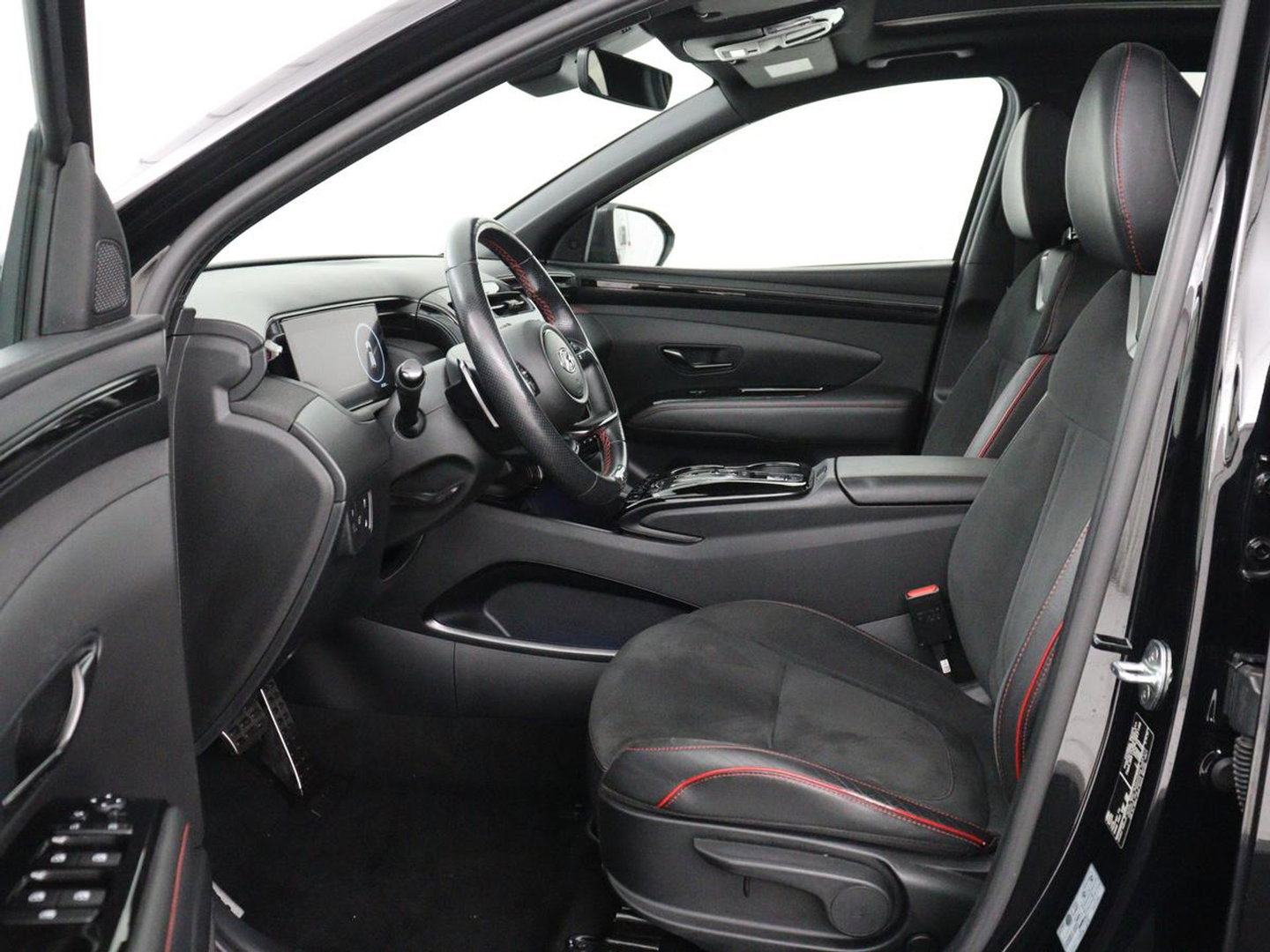 Hyundai Tucson 1.6 T-GDI PHEV N Line Sky 4WD | Panoramadak | Stoelverwarming | Leder/Alcantara | Camera | Adaptive cruise | Carplay | Full LED | Stuurverwarming | Keyless | Plug In