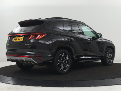 Hyundai Tucson 1.6 T-GDI PHEV N Line Sky 4WD | Panoramadak | Stoelverwarming | Leder/Alcantara | Camera | Adaptive cruise | Carplay | Full LED | Stuurverwarming | Keyless | Plug In