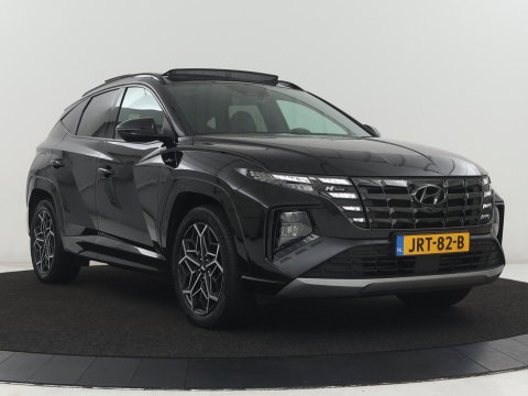 Hyundai Tucson 1.6 T-GDI PHEV N Line Sky 4WD | Panoramadak | Stoelverwarming | Leder/Alcantara | Camera | Adaptive cruise | Carplay | Full LED | Stuurverwarming | Keyless | Plug In
