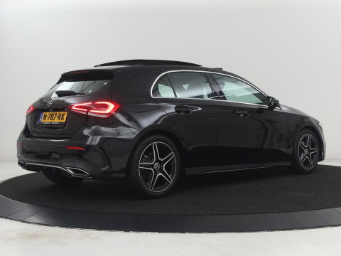 Mercedes-Benz A-Klasse 180 Business Solution AMG | Panoramadak | Carplay | Cruise control | Climate control | DAB+ | Navigatie | Bluetooth | Stoelverwarming | Park assist