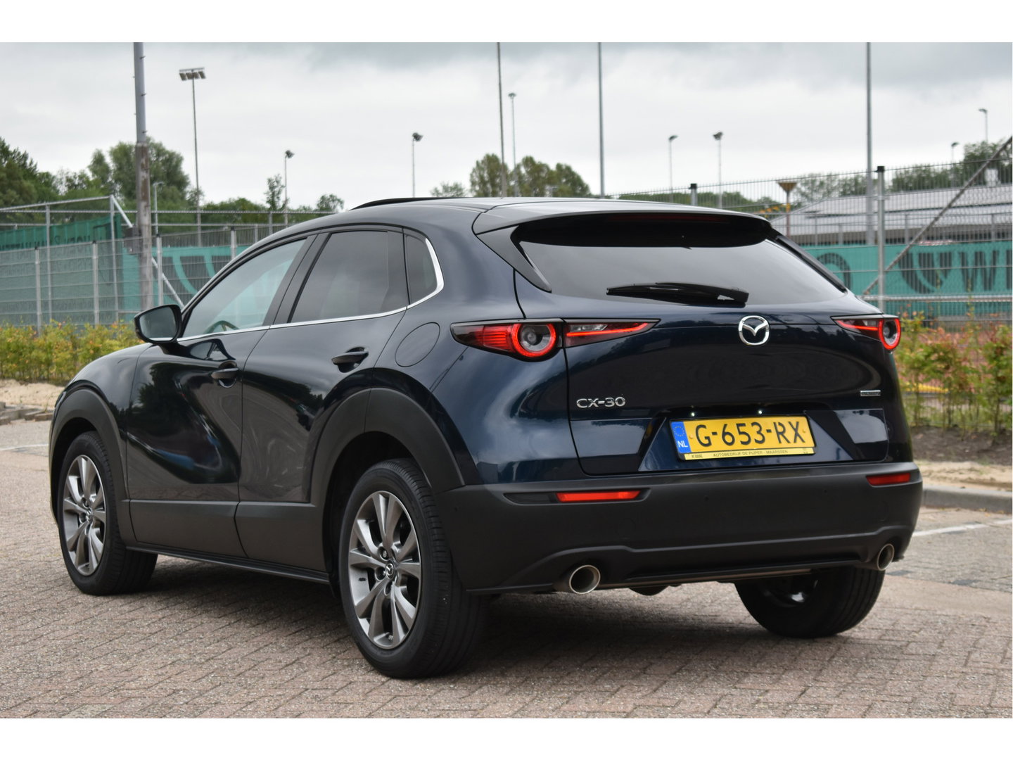 Mazda CX-30 2.0 e-SkyActiv-X M Hybrid Luxury 180 pk | NL-Auto | Open dak | HUD | BOSE | 360 gr.camera | Elekt.stoelen | Leder | Carplay | Full LED