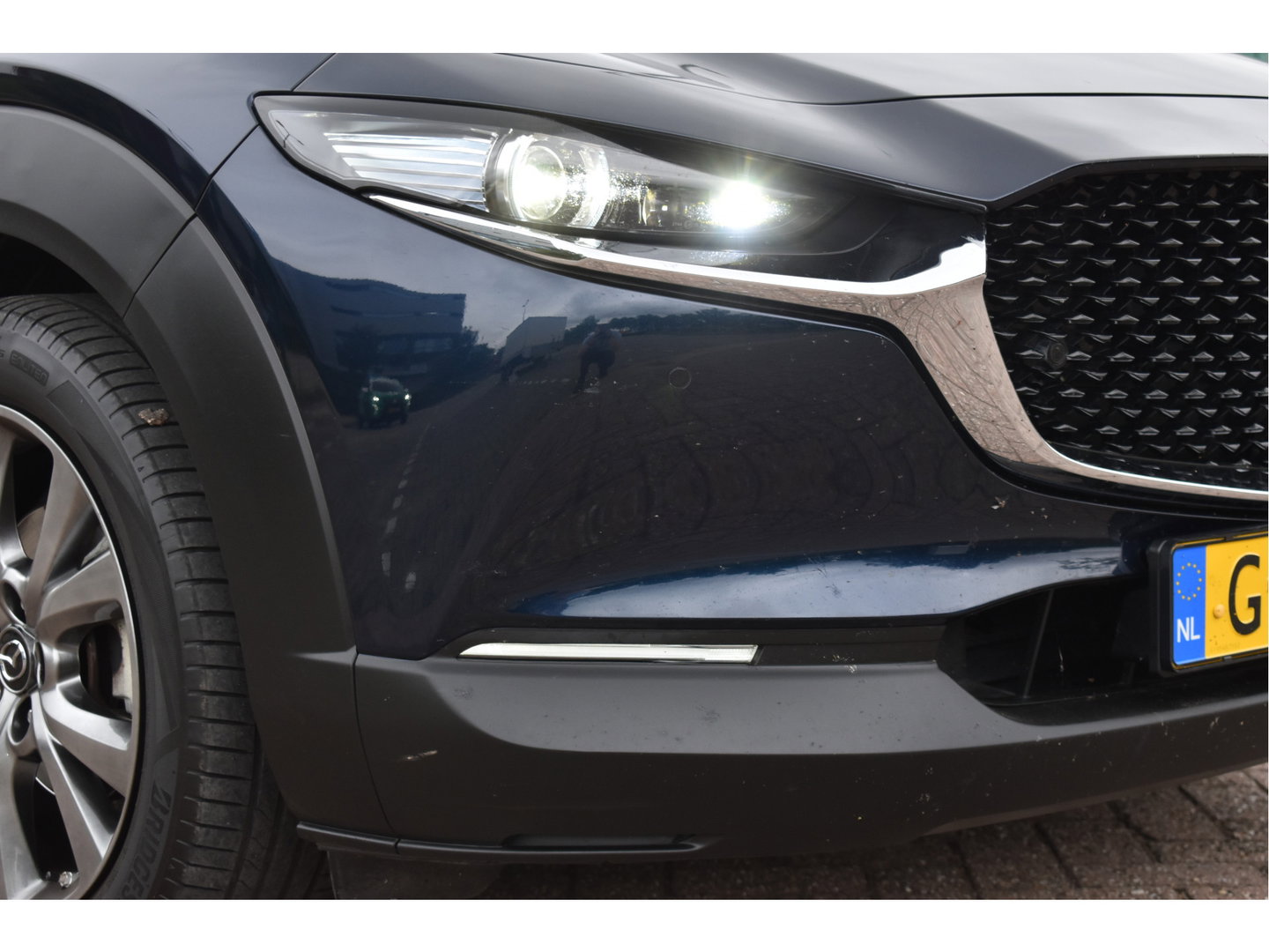 Mazda CX-30 2.0 e-SkyActiv-X M Hybrid Luxury 180 pk | NL-Auto | Open dak | HUD | BOSE | 360 gr.camera | Elekt.stoelen | Leder | Carplay | Full LED