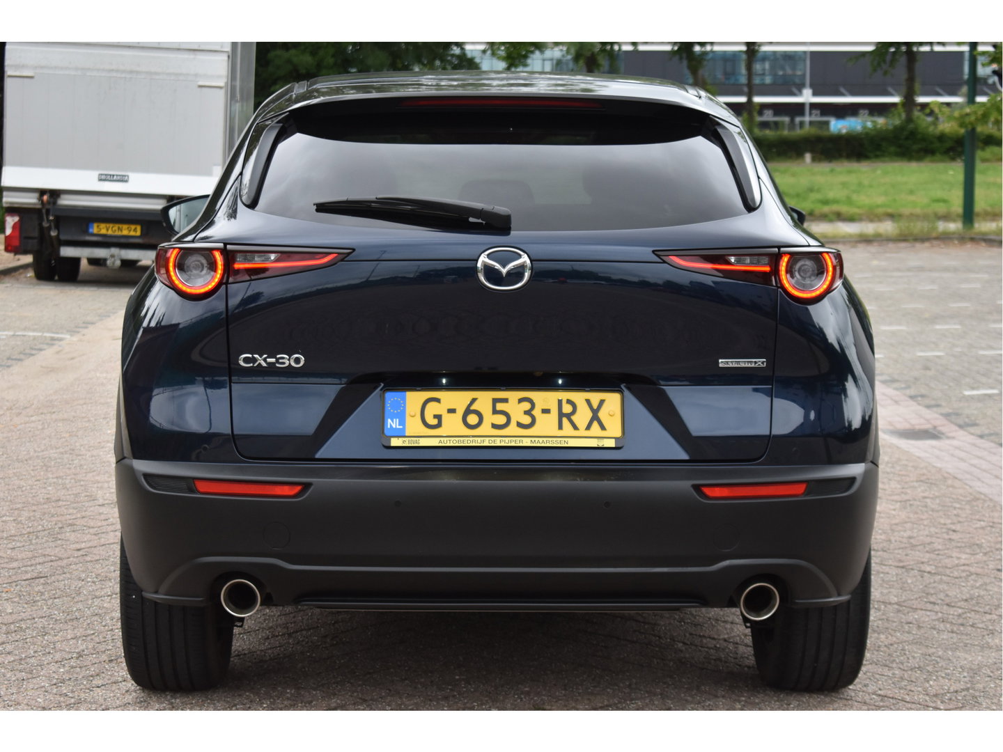 Mazda CX-30 2.0 e-SkyActiv-X M Hybrid Luxury 180 pk | NL-Auto | Open dak | HUD | BOSE | 360 gr.camera | Elekt.stoelen | Leder | Carplay | Full LED