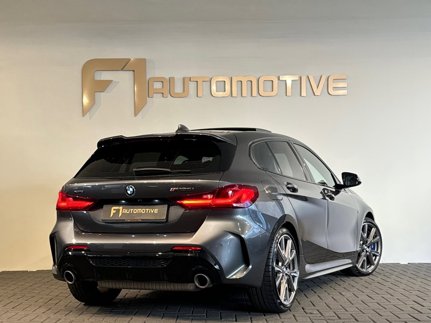 BMW 1-serie M135i xDrive High Executive Edition Pano|HuD|H/K