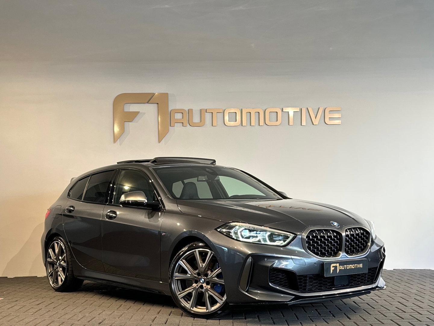 BMW 1-serie M135i xDrive High Executive Edition Pano|HuD|H/K