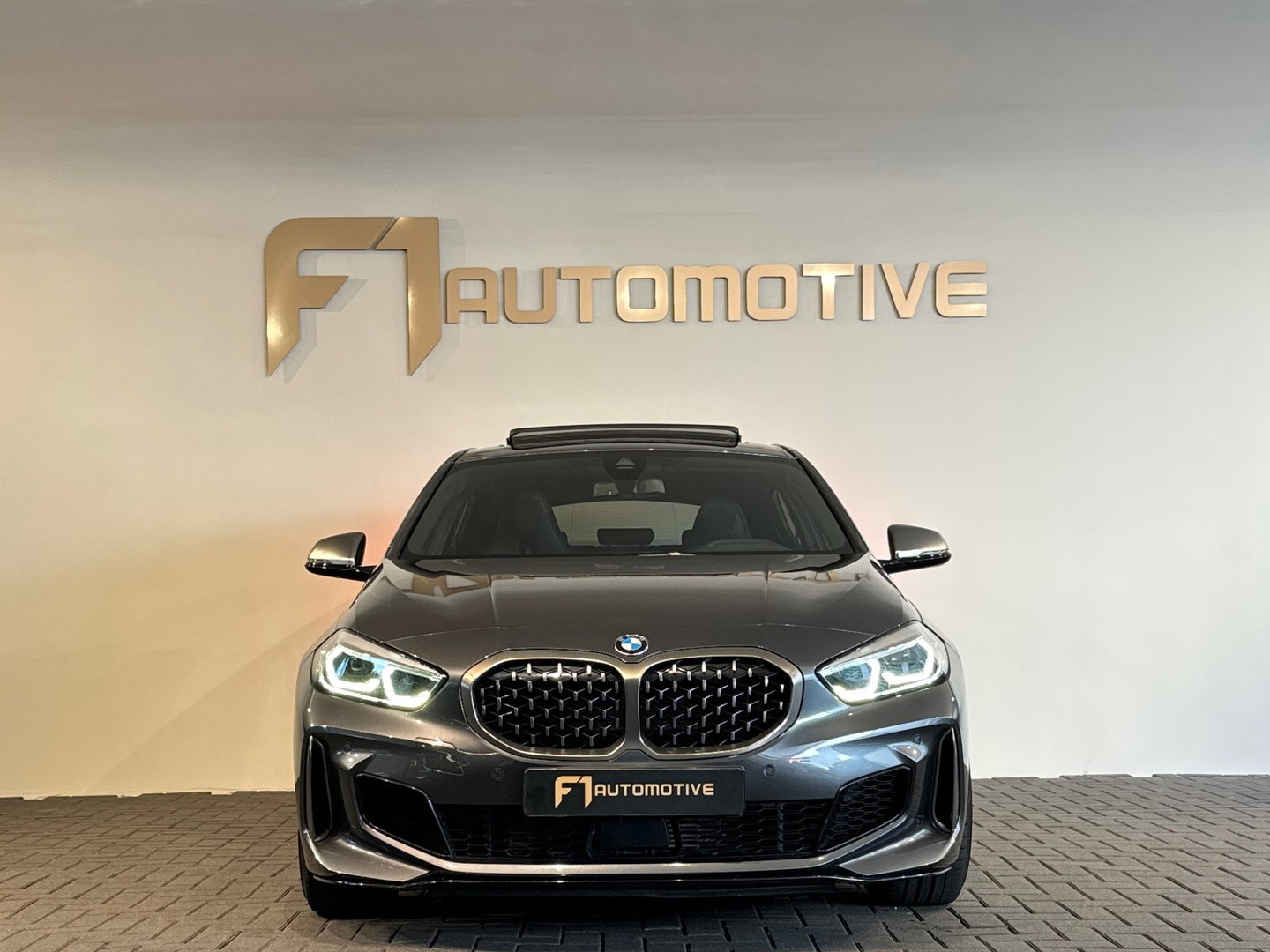 BMW 1-serie M135i xDrive High Executive Edition Pano|HuD|H/K