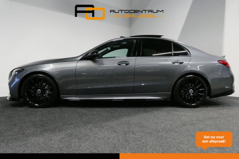 Mercedes-Benz C-Klasse 200 AMG Line / Orig. Nederlands / C63S AMG Diffuser / Panamericana Grille / Panoramadak / Elektr. verstelbare voorstoelen (links met memory) / Apple Carplay - Android Auto / Stoelverwarming / Ambienteverlichting / High Performance LED koplampen / Achterui