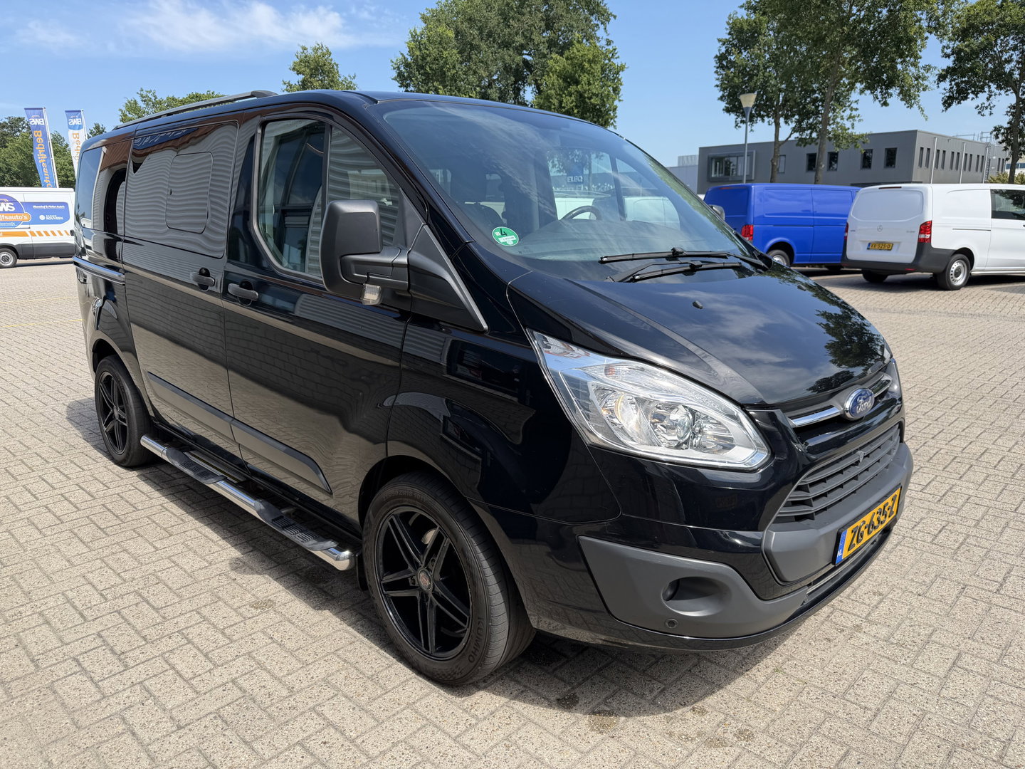 Ford Transit Custom Tourneo 310 2.0 TDCI 130pk L1H1 Titanium / vaste prijs rijklaar € 19.950 incl btw / euro 6 / zwart metallic / airco / cruise / navigatie / trekhaak / camera / isofix !