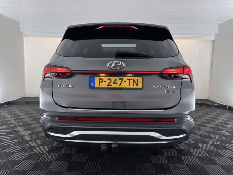 Hyundai Santa Fe 1.6 T-GDI PHEV Comfort Smart Sky [ 7-Pers. ] (INCL-BTW) *PANO | LEATHER | FULL-LED | ADAPTIVE-CRUISE | BLINDSPOT | MEMORY-PACK | DIGI-COCKPIT | SHIFTPADDLES | PRIVACYGLASS | NAVI-FULLMAP | TOWBAR | 19''ALU*