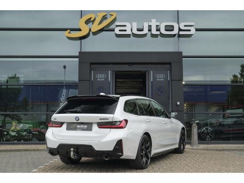 BMW 3 Serie Touring 330e xDrive M-sport M3 stoelen Panoramadak *SOH 98%* Memory *BTW* Black pack NLauto 19" LMV