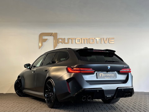 BMW 5 Serie Touring M5 Pano|Keramisch|B&W|HuD|Carbon|M Drivers