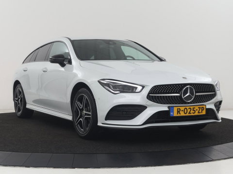 Mercedes-Benz CLA-Klasse Shooting Brake 250 e AMG Line | SOH 92.9% | Trekhaak | Leder | Camera | Carplay | Park assist | Cruise control | Sfeerverlichting | Stoelverwarming | Full LED | Climate control |