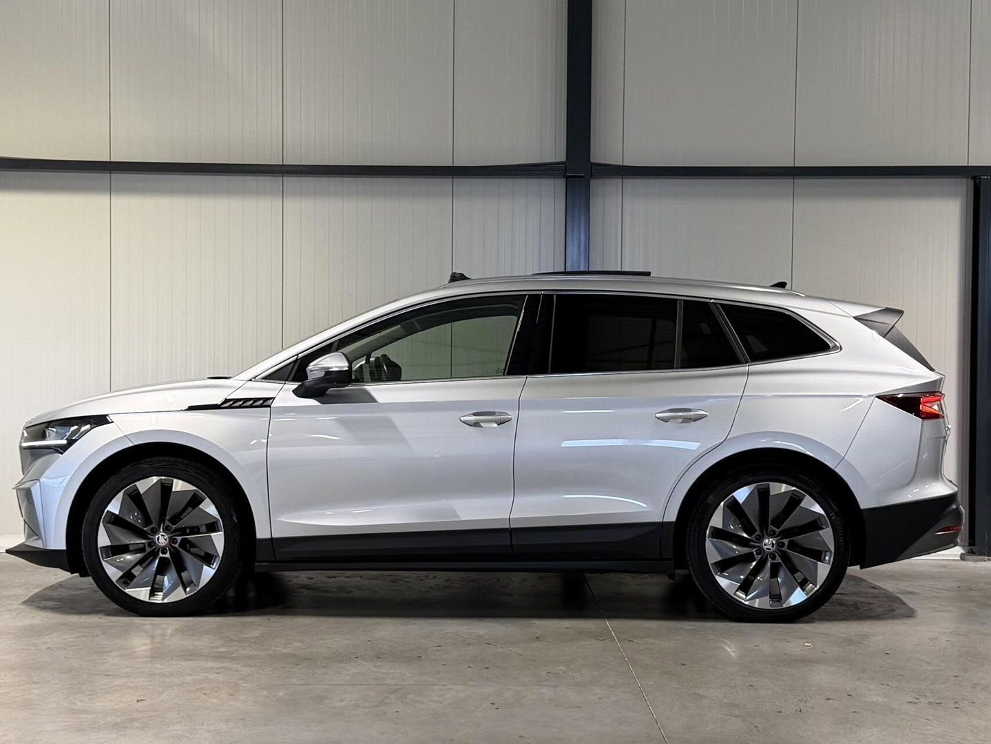 Škoda Enyaq iV 80 Pano Trekhaak Camera Warmtepomp SOH 87%