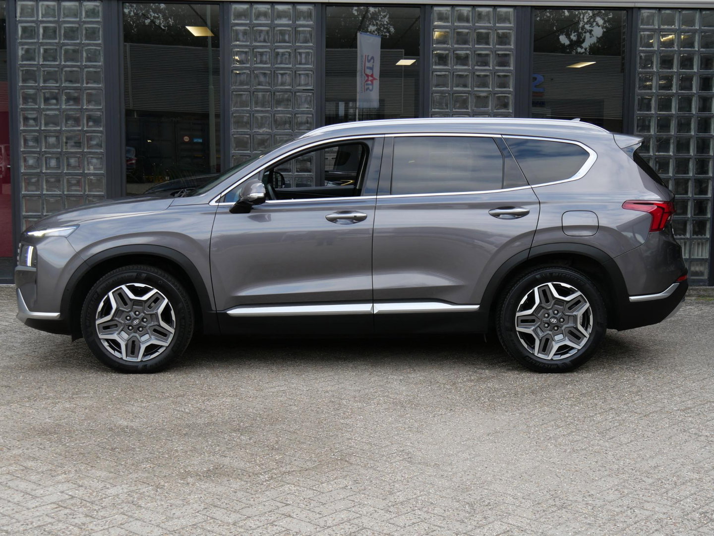 Hyundai Santa Fe HEV PREMIUM/ 7-PERSOONS/ TREKHAAK/ 360° CAMERA/