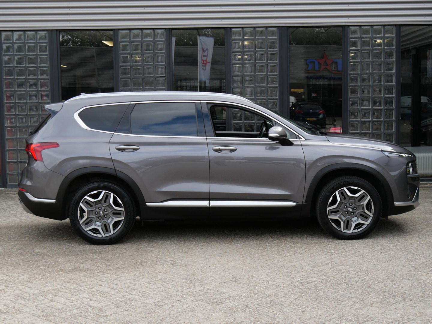 Hyundai Santa Fe HEV PREMIUM/ 7-PERSOONS/ TREKHAAK/ 360° CAMERA/