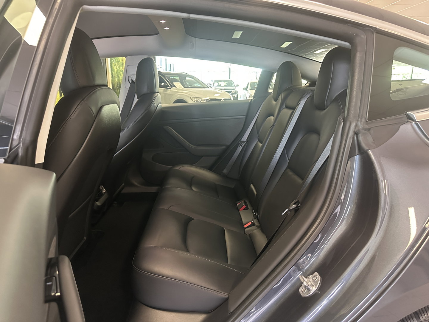 Tesla Model 3 Long Range AWD 75 kWh | 351 PK! | Origineel Nederlands | Leder | Autopilot | Premium Audio | Panoramadak | Elektrische Stoelen |  Stoelverwarming | Achterbankverwarming |