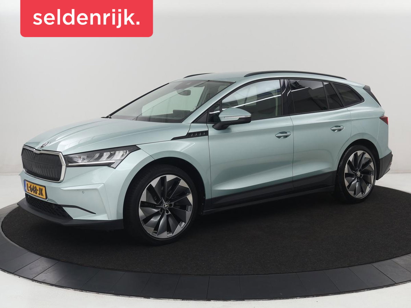 Škoda Enyaq iV 60 | SOH 92.1% | Trekhaak | Stuur/stoel verwarming | Half Leder | Cruise control | Camera | Carplay | Standkachel | Sfeerverlichting | 21''